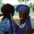 Deux Yaye Fall en costumes bleus. Touba, Sénégal, février 2008.